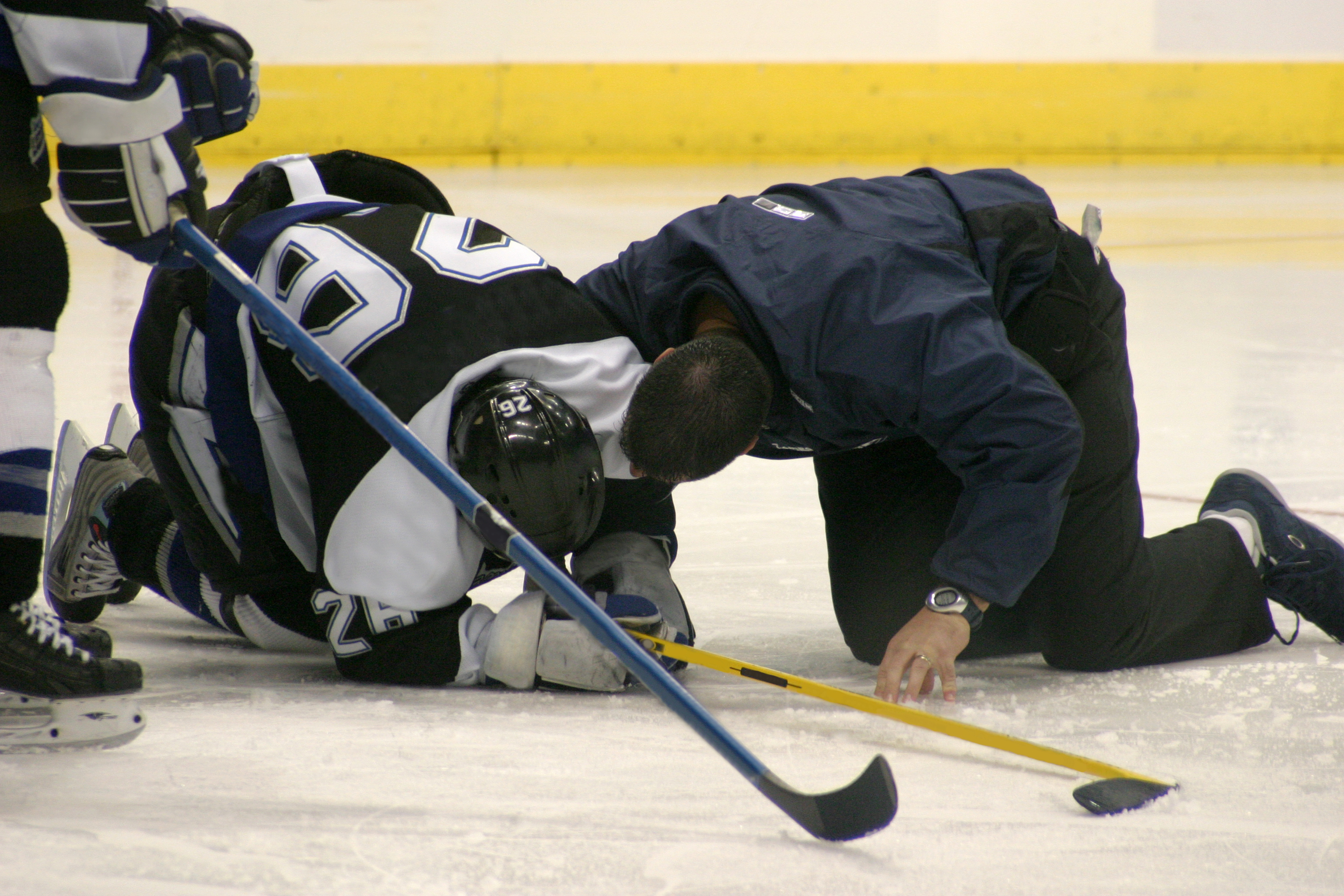 Hockey player injured on ice