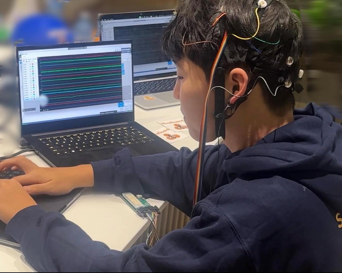 Youth hockey athlete wearing EEG sensors during data collection